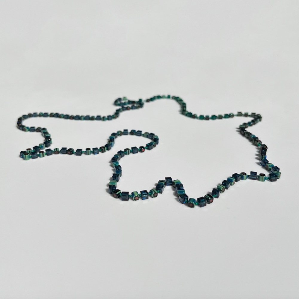 Swarovski, Murano Glass
Hand-Knotted w/ Sterling Silver Necklace